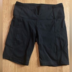 Wunder Train High-Rise Short with Pockets 6" Biker Shorts